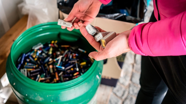 Batteries being disposed of in recycling center.